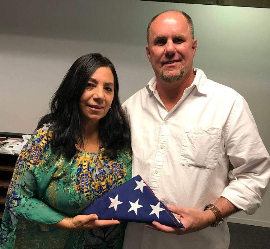 (Hali Bernstein Saylor/Boulder City Review) Mari and Joe Fex of Boulder City found a flag on th ...