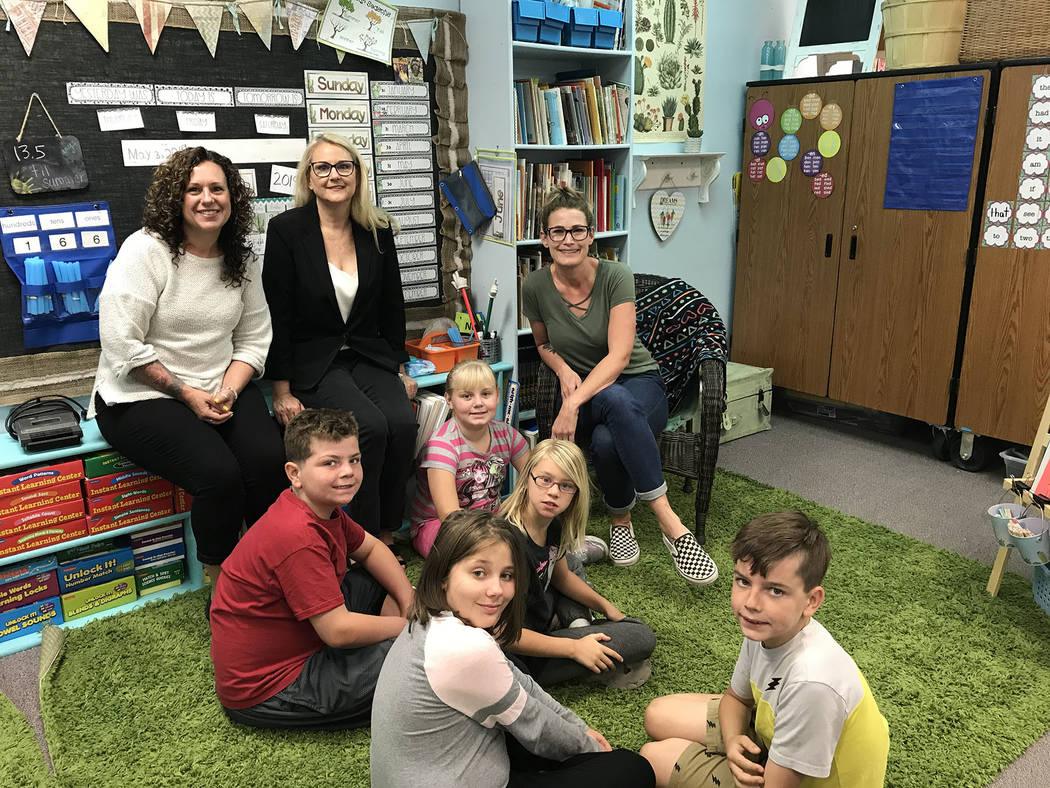 (Hali Bernstein Saylor/Boulder City Review) April Hoover, seated at right, and Tina Coleman, se ...