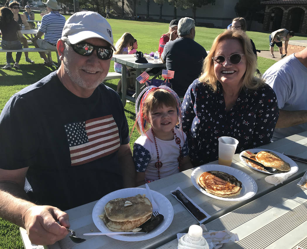 (Hali Bernstein Saylor/Boulder City Review) Enjoying a pancake breakfast presented by the Rotar ...