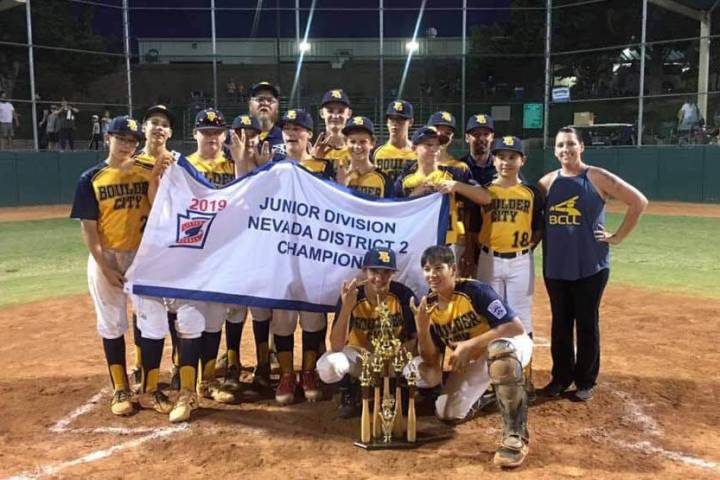 (Katie Kilar) Members of Boulder City’s Little League team celebrate winning the District II ...