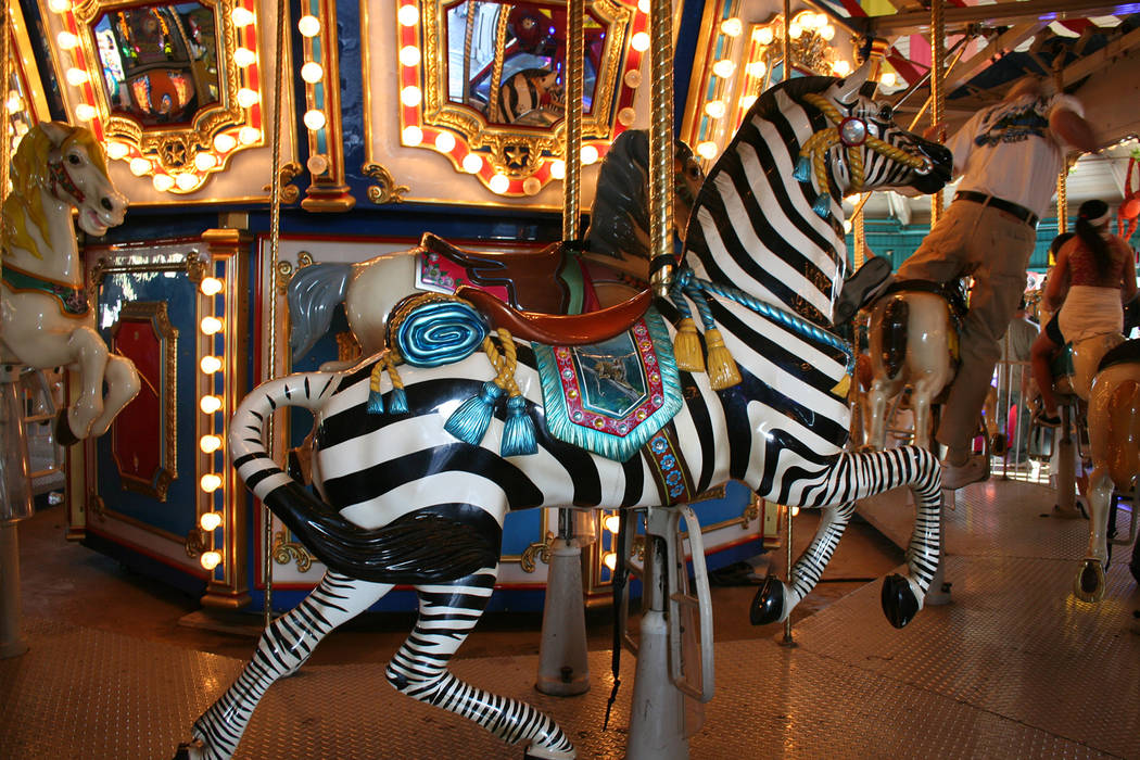 (Deborah Wall) Brightly painted animals, such as this zebra, are a big draw for children who wa ...