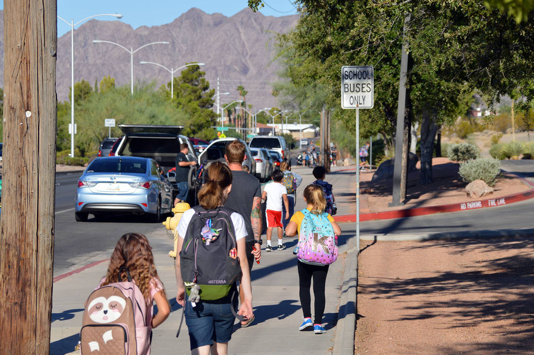 (Celia Shortt Goodyear/Boulder City Review) Students walk to school before class starts Tuesday ...