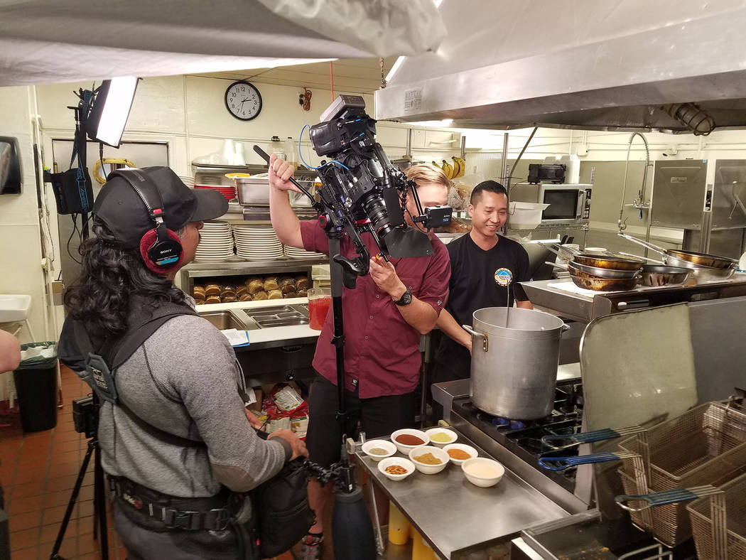 (Terry Stevens) Jay Lavetoria, right, a cook at the World Famous Coffee Cup, is filmed in Octob ...