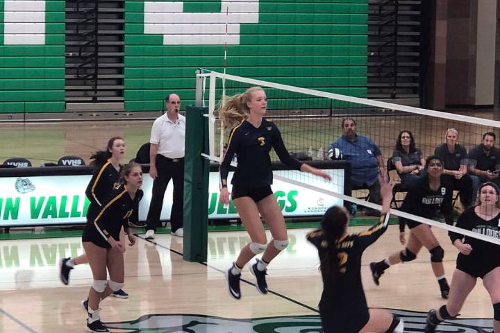 (Boulder City High School) Boulder City High School sophomore Katie Prior jumps for the ball du ...