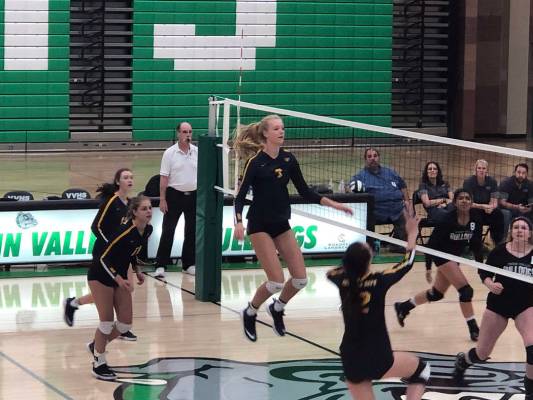 (Boulder City High School) Boulder City High School sophomore Katie Prior jumps for the ball du ...