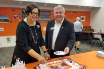 (Celia Shortt Goodyear/Boulder City Review) Boulder City Library Director Kim Diehm cuts the ca ...