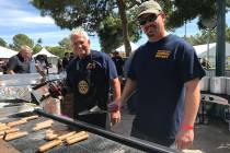 Dale Ryan, left, and Jim Parsons manned the grill at the 2018 Würst Festival presented by the ...