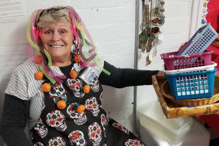 (Celia Shortt Goodyear/Boulder City Review) Volunteer Ursula Stelzner mans the baskets in the j ...