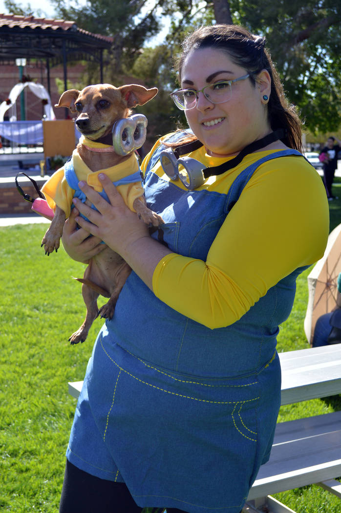 Jessica Abolnik and her dog, Winnie, dressed up as minions for the owner/duo category at the fi ...