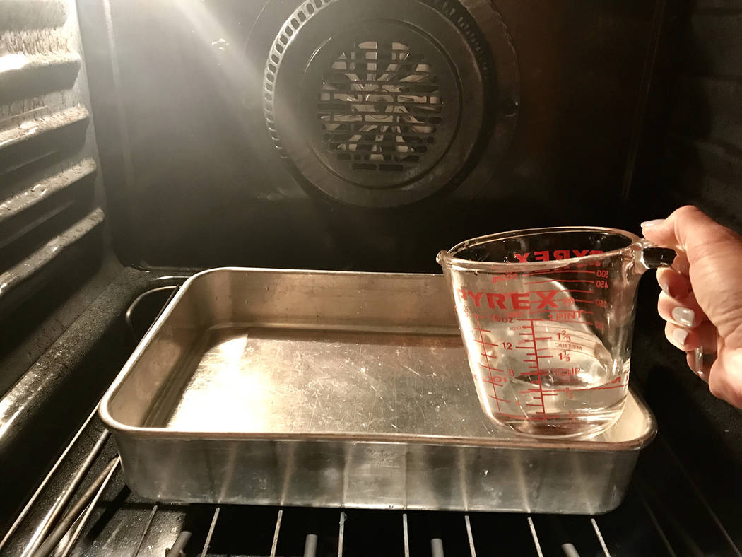 (Norma Vally) Heating a pan of water to create steam will allow you to clean your oven without ...