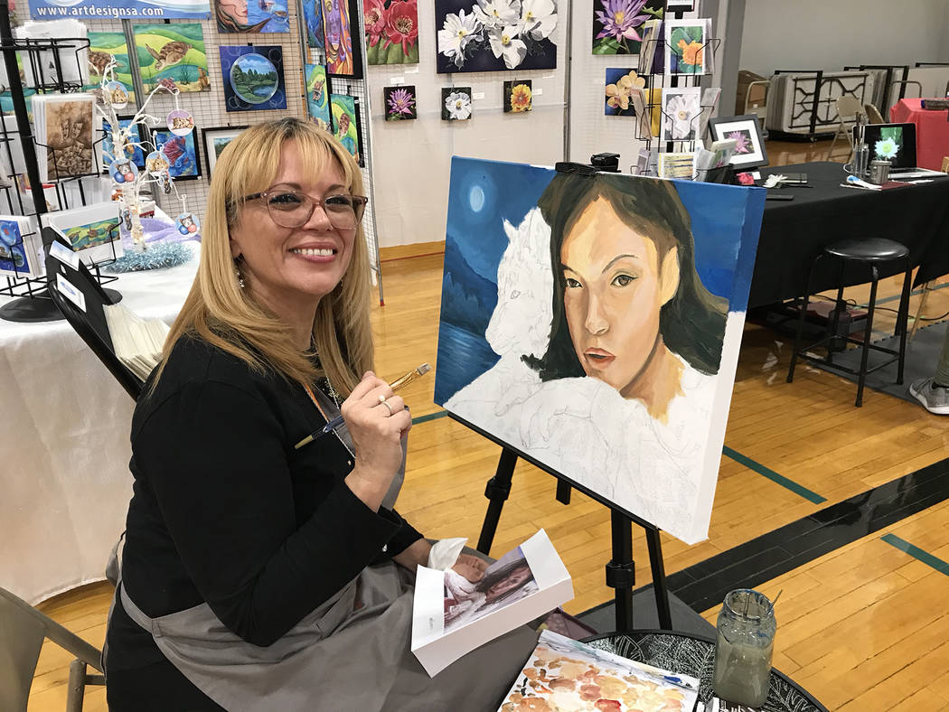 (Hali Bernstein Saylor/Boulder City Review) Sylvia Aldebol demonstrates her painting technique ...