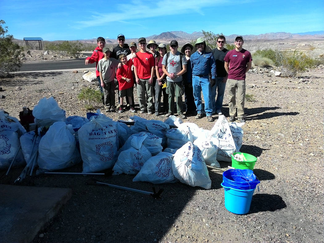 (Scott Meyer) Members of Boy Scout Troop 7 of Boulder City participated in a clean-up event at ...