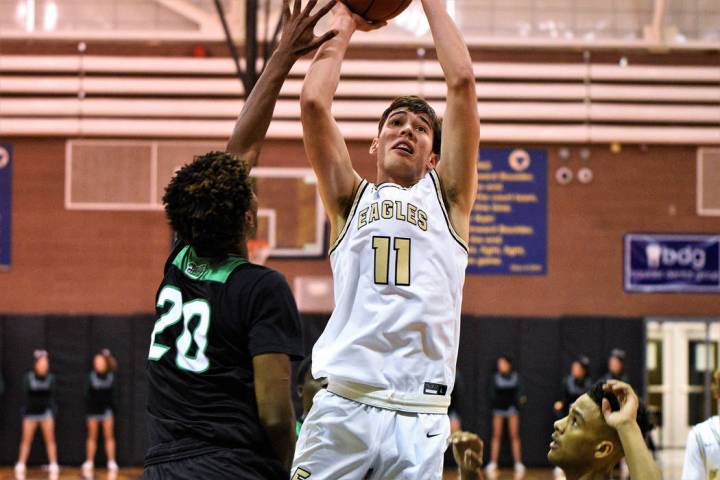 (Robert Vendettoli/Boulder City Review) Going up for a putback jumper, Boulder City High School ...