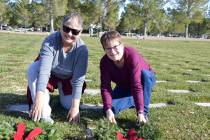 Celia Shortt Goodyear/Boulder City Review Lila Bair, left, and Kolleen Stolte lay wreaths on th ...