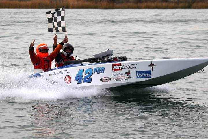 (Mark McLaughlin Photography) Matt Bookey, left, drives P42 Penalty Box, a crackerbox boat owne ...