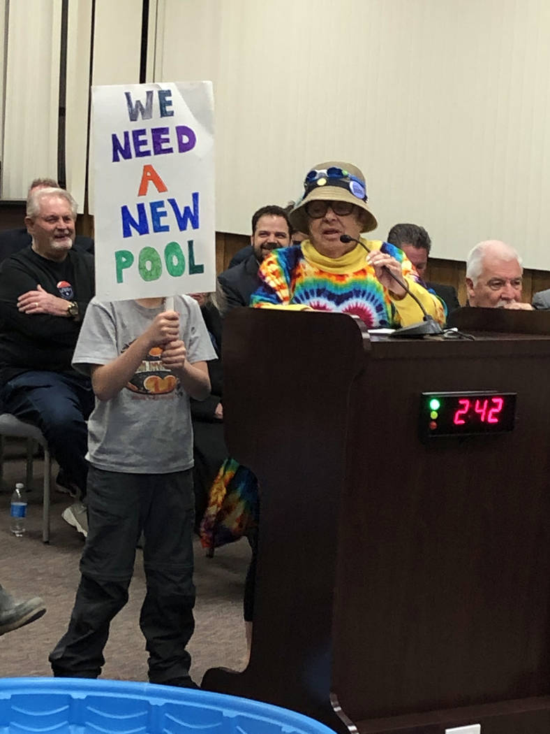 Boulder City Jan Miller and her grandson showed their support for a new pool during the Feb. 26 ...