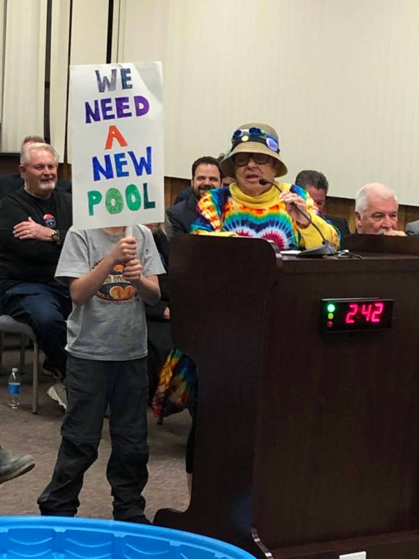 Boulder City Jan Miller and her grandson showed their support for a new pool during the Feb. 26 ...