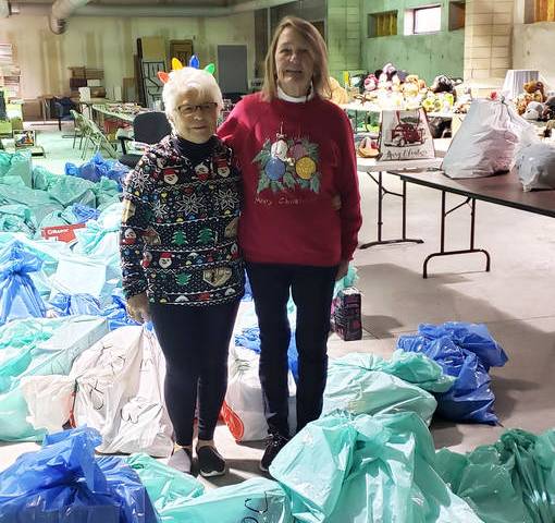(Emergency Aid of Boulder City) Emergency Aid of Boulder City distributed Christmas gifts from ...