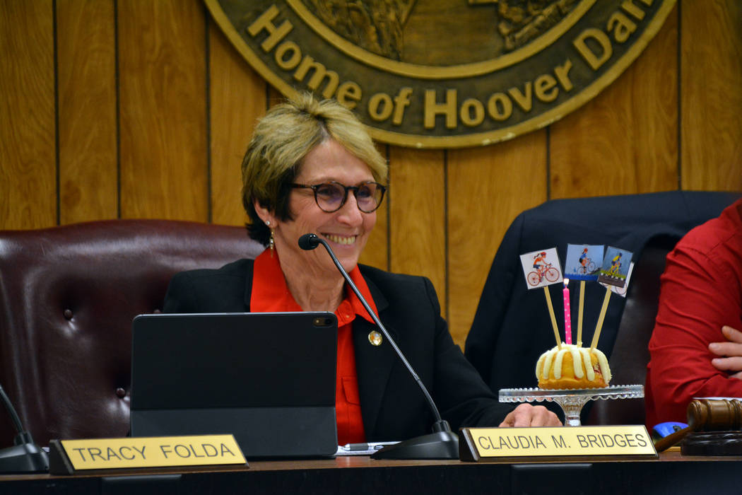(Celia Shortt Goodyear/Boulder City Review) Councilwoman Claudia Bridges is presented with a ca ...