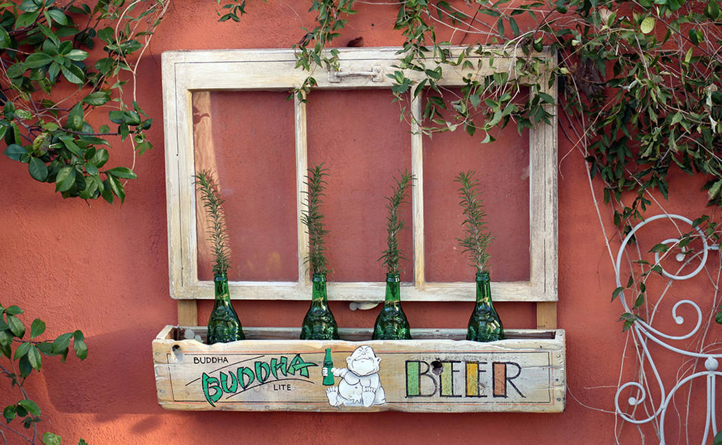 (Norma Vally) Old window frames can be repurposed into wall or garden accents, especially when ...
