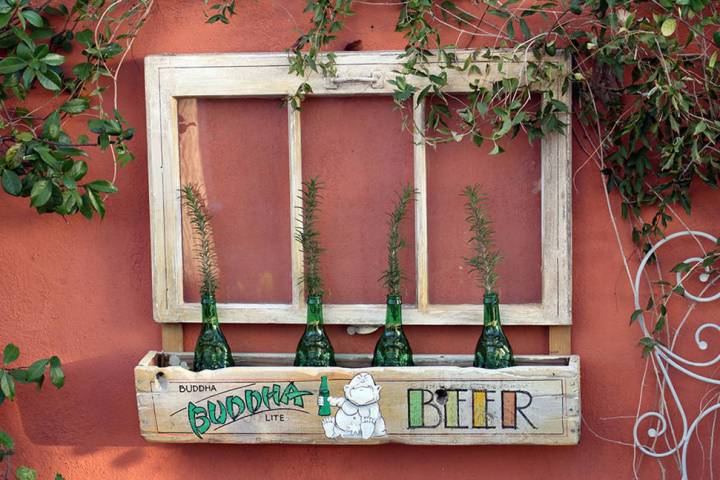 (Norma Vally) Old window frames can be repurposed into wall or garden accents, especially when ...