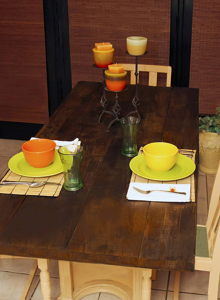 (Norma Vally) Transform an old wood door into a dining table with a fresh coat of stain before ...