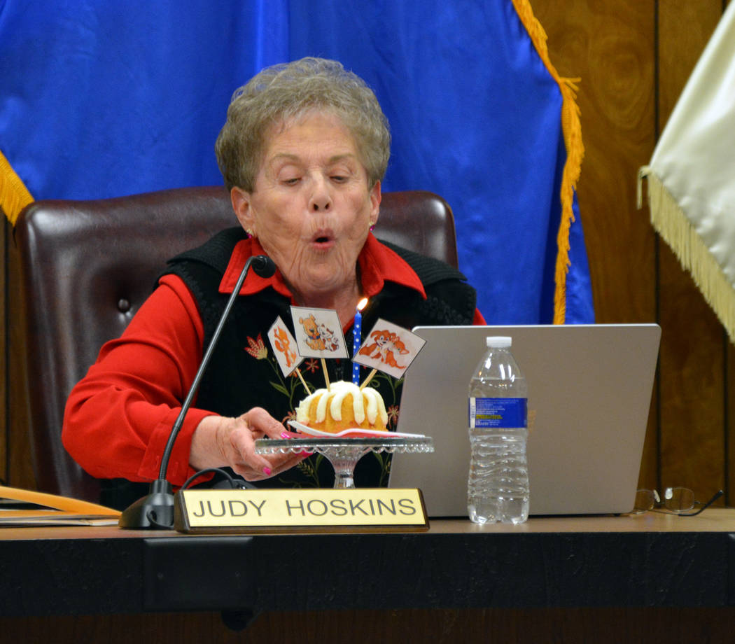 (Celia Shortt Goodyear/Boulder City Review) Councilwoman Judy Hoskins blows out the candles on ...