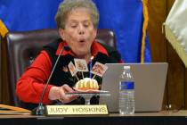 (Celia Shortt Goodyear/Boulder City Review) Councilwoman Judy Hoskins blows out the candles on ...