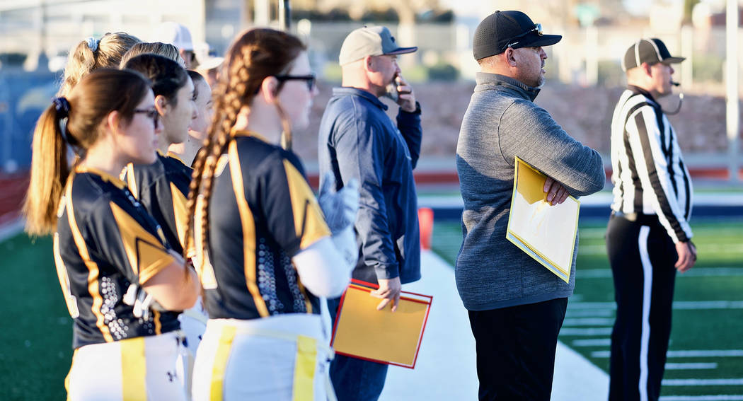 (Jamie Jane/Boulder City Review) Kevin Ruth, center in blue, head coach for Boulder City High S ...