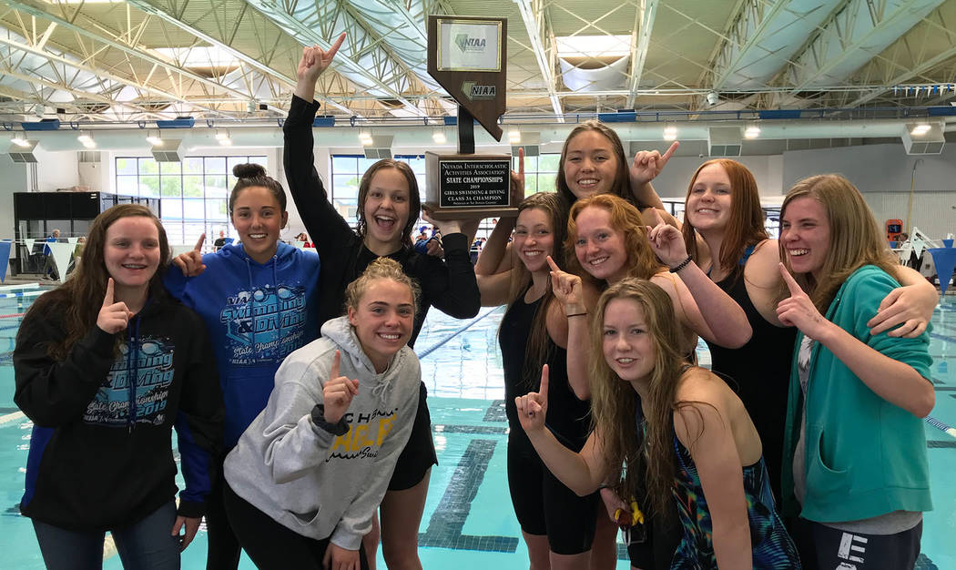 Many members of last year's championship girls swim team from Boulder City High School are retu ...