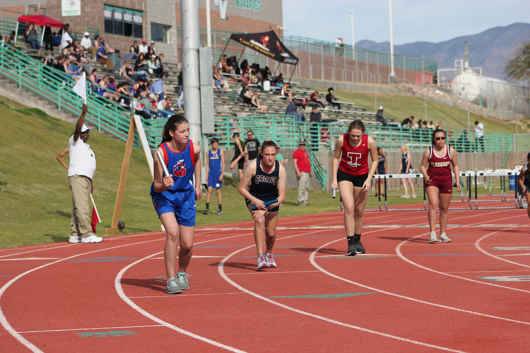 (Mark Misuraca) Boulder City High School sophomore Mary Henderson, second from left, led of 4x8 ...