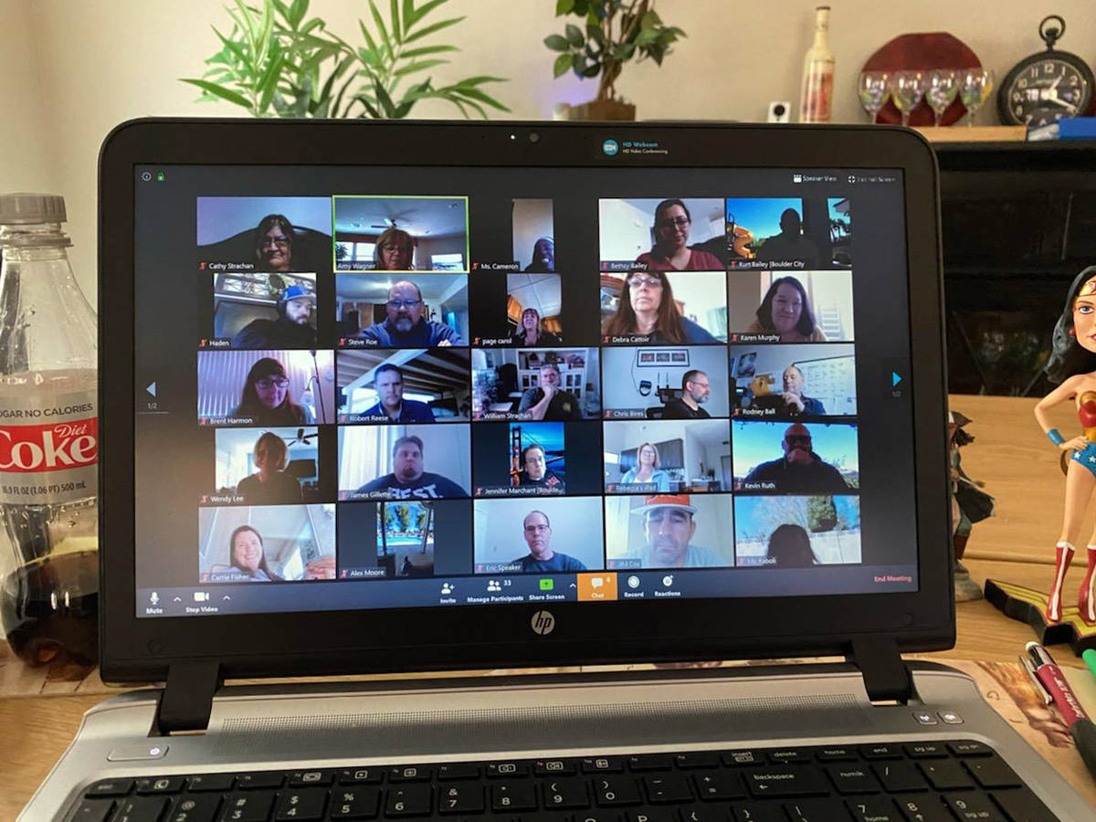 Amy Wagner Boulder City High School teachers utilize Zoom for their faculty meetings while the ...