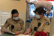 (Boulder City Animal Shelter) Boulder City Animal Control officer Rebecca Schuster, left, and A ...