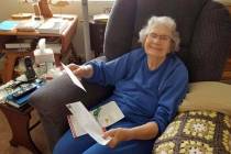 (Lakeview Terrace of Boulder City) Edna Komada, 89, reads letters that were sent to Lakeview Te ...