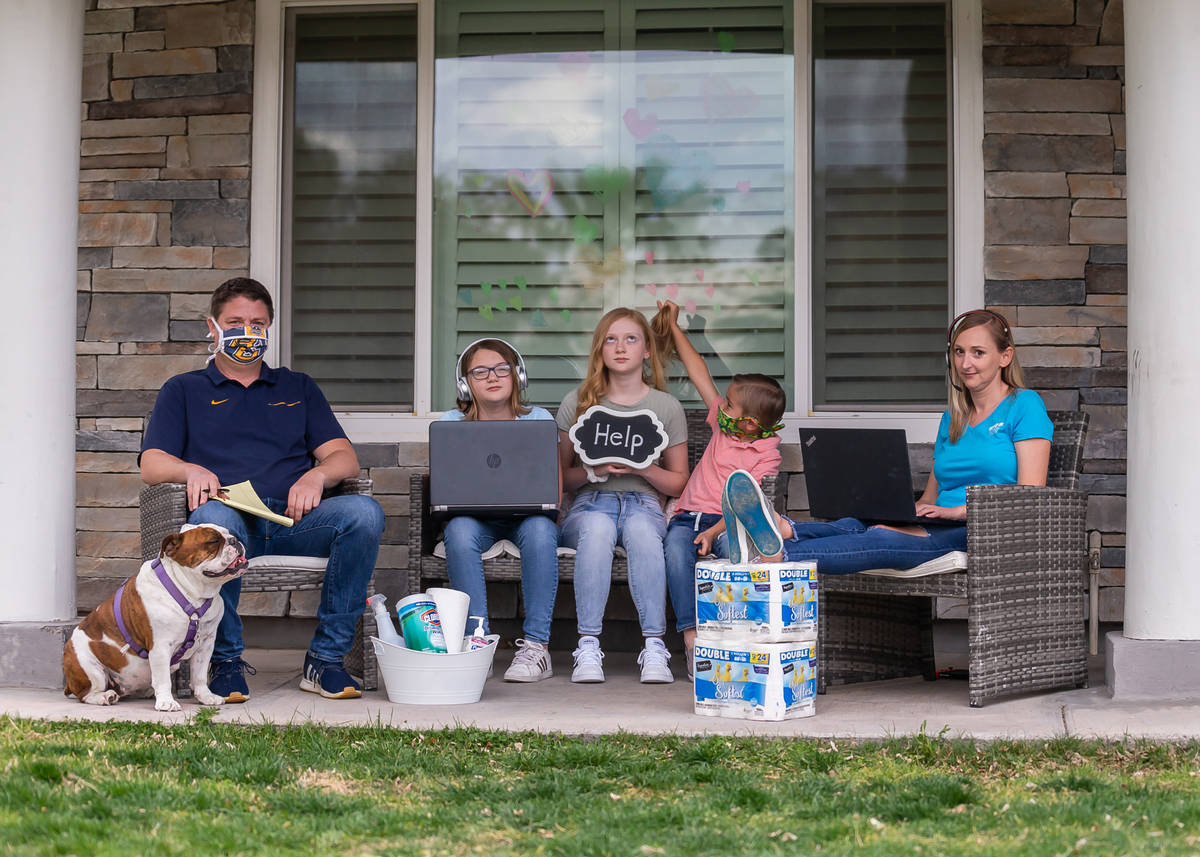(Vegas Valley Photography) The Steckelberg family posed for a free porch portrait taken by Jenn ...