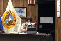Boulder City Councilman James Howard Adams wears a mask at Tuesday's, April 28, council meetin ...