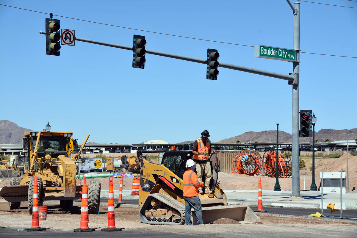 Celia Shortt Goodyear/Boulder City Review Workers with William Charles Construction repave the ...