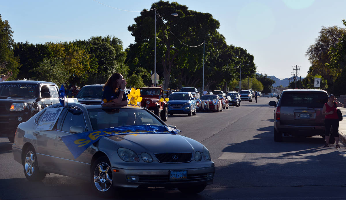 Celia Shortt Goodyear/Boulder City Review Cars and members of the class of 2020 fill Fifth Aven ...