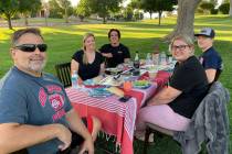 (Hali Bernstein Saylor/Boulder City Review) Enjoying an evening picnic Monday, June 29, in Wilb ...