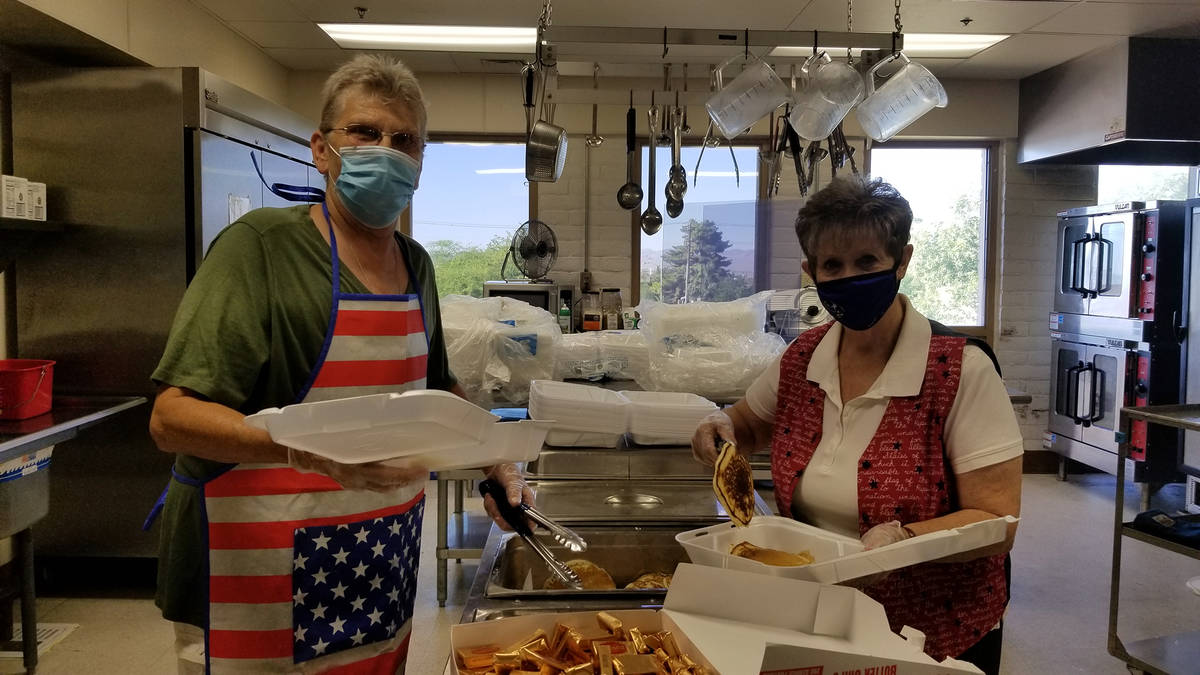 Celia Shortt Goodyear/Boulder City Review Mona Goddard, left, and Kathy Emling prepare pancake ...