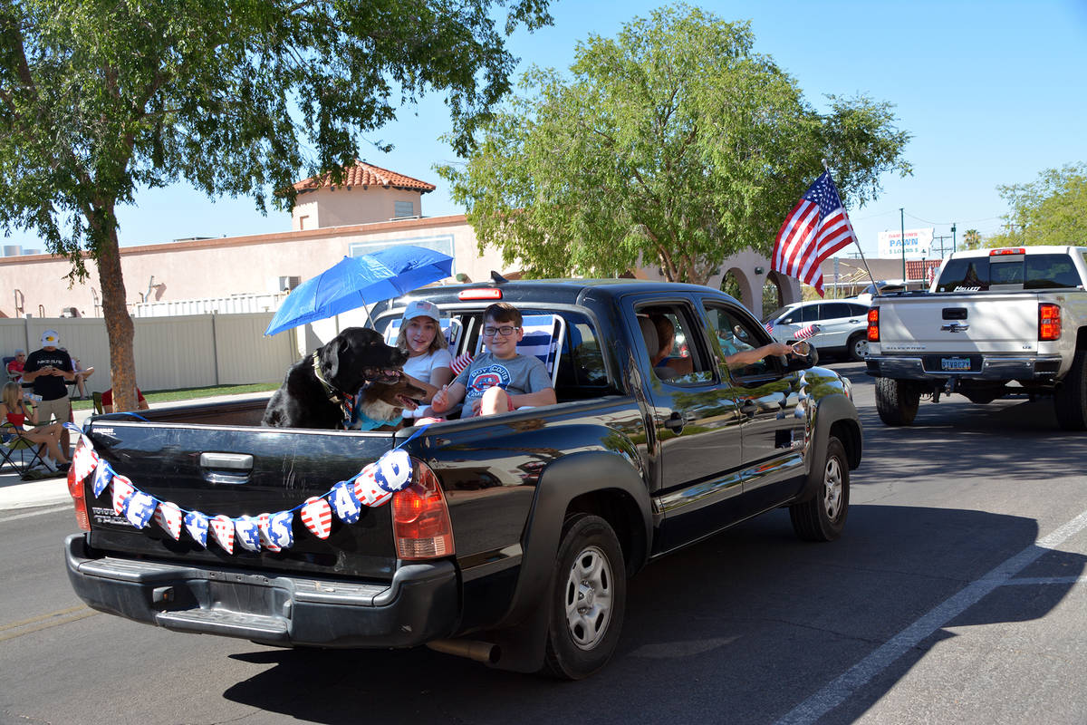 (Celia Shortt Goodyear/Boulder City Review) A family participates in the parade Saturday, July ...