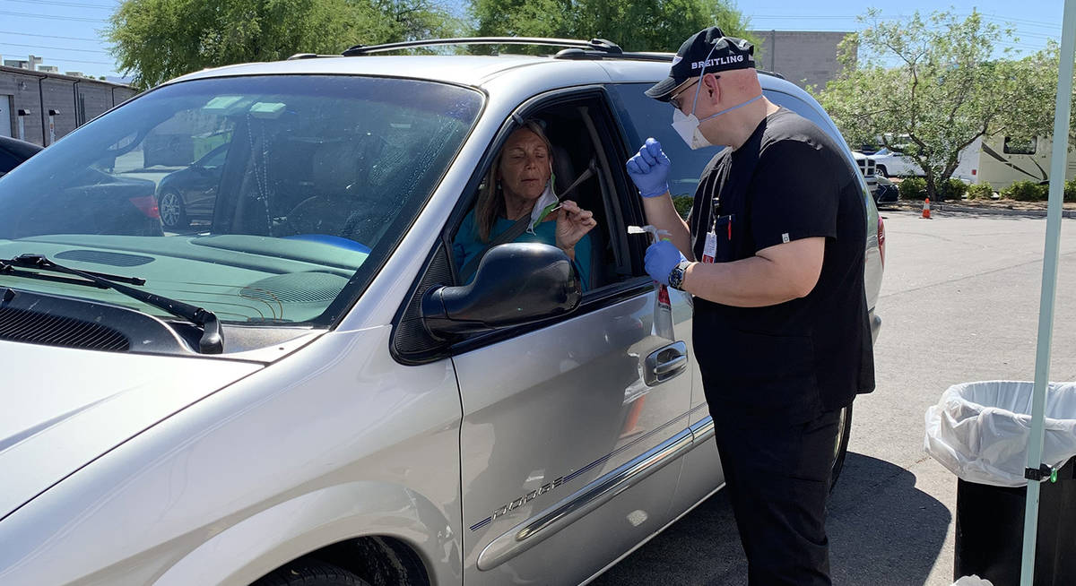 (Hali Bernstein Saylor/Boulder City Review) Anna Krone of Boulder City gets instructions from J ...