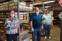 Emergency Aid of Boulder City volunteers, from left, Lori McHugh, Tom Tyler and Sue Zupanick co ...