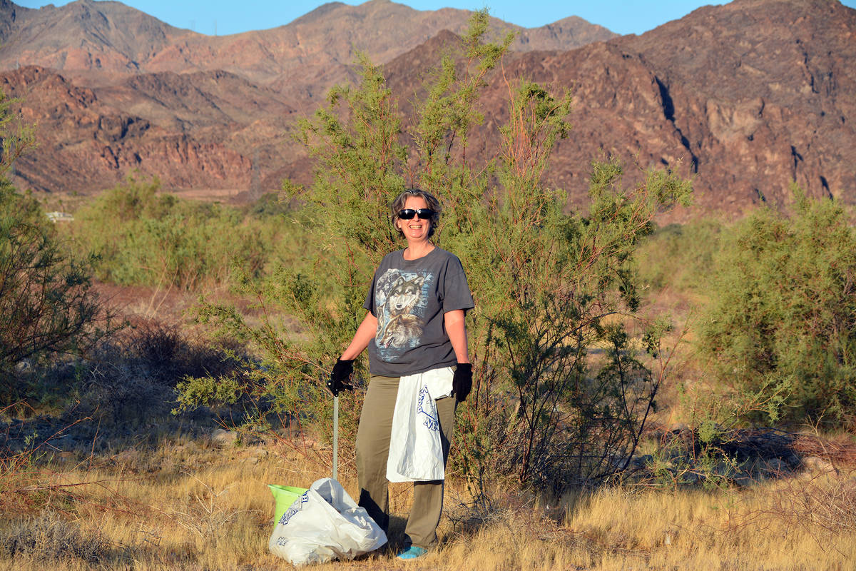 Celia Shortt Goodyear/Boulder City Review Dominique Spitzers helps clean up the special event b ...