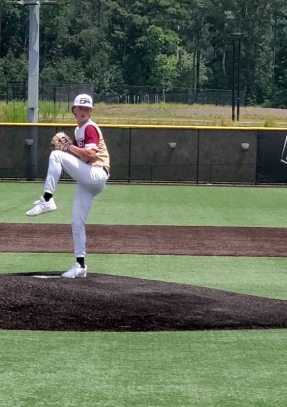 (Lori Giunta) Boulder City High School sophomore Seth Graham-Pippin showcases his pitching skil ...