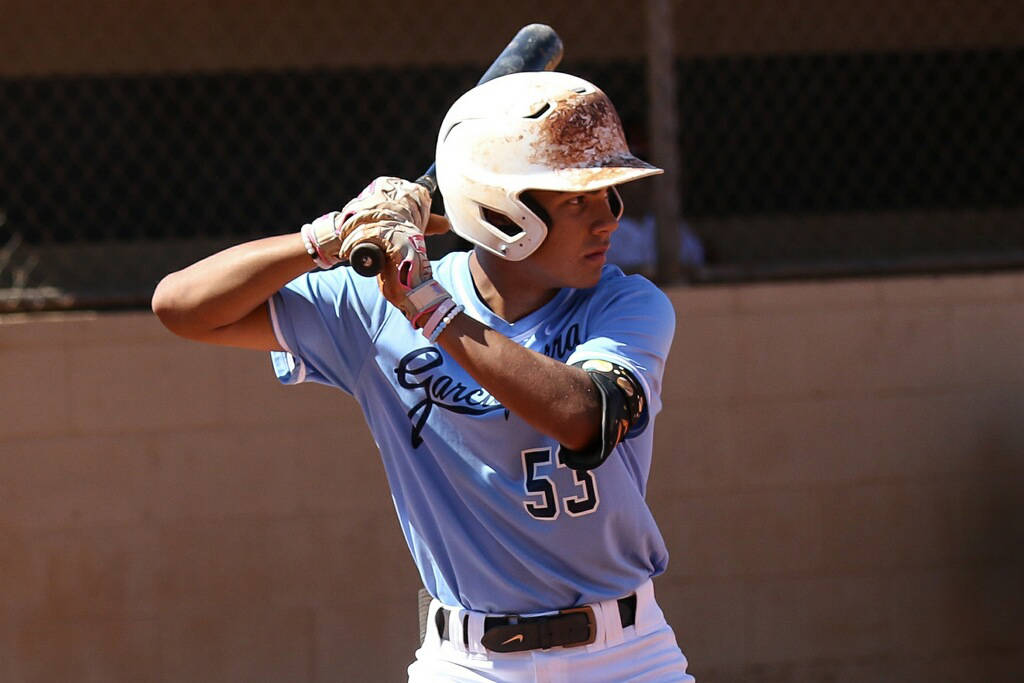 (Yong Dawson Photography) Jet Gilliam, a sophomore at Boulder City High School, awaits his pitc ...