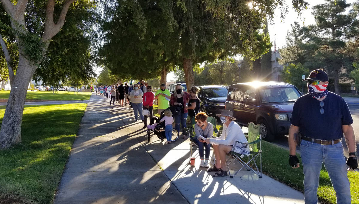 Celia Shortt Goodyear/Boulder City Review Residents lined up to cast their vote at City Hall on ...