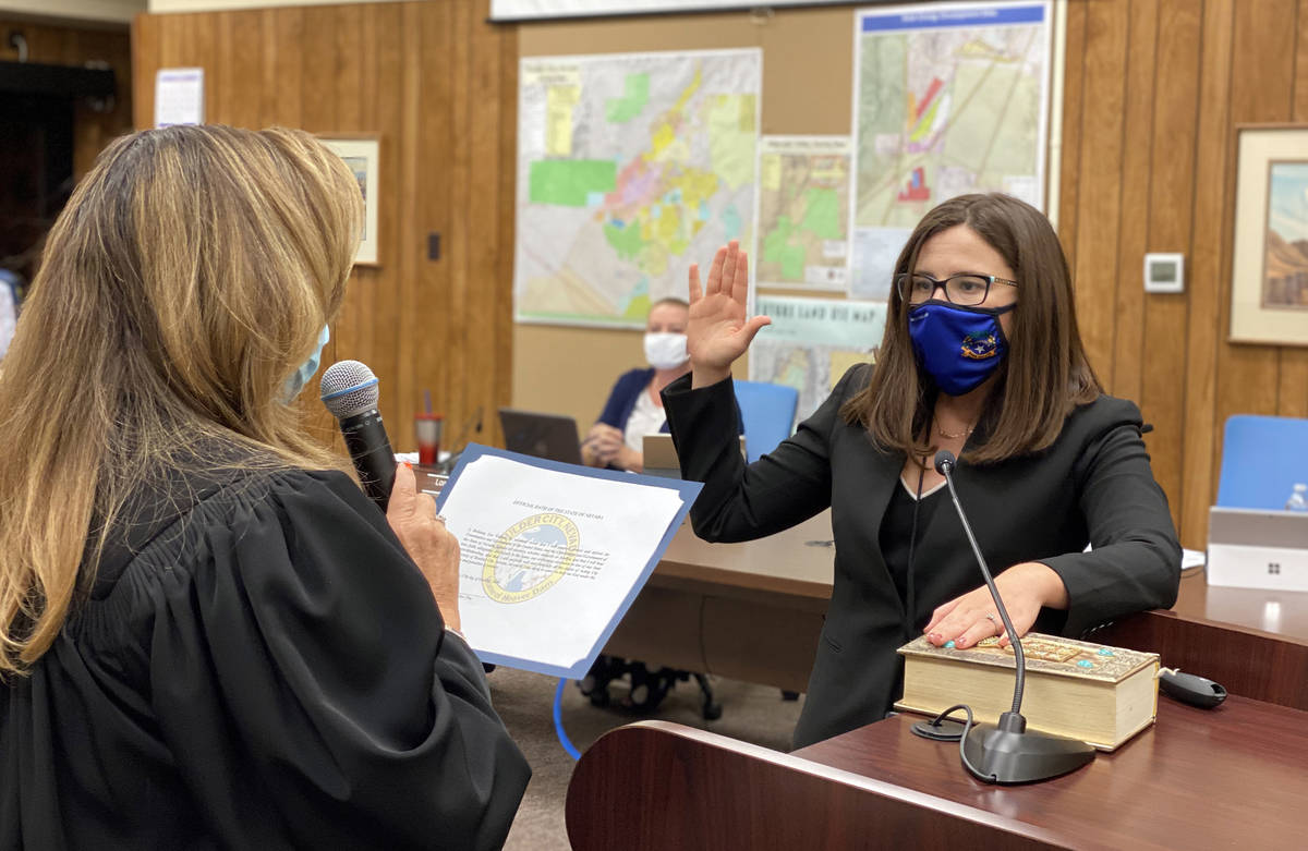 Boulder City Justice Abbi Silver, left, swears in Brittany Walker as the acting city attorney a ...