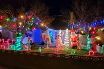 Mike Pacini Mike and Morgan Pacini's home at 653 Arrayo Way features a Christmas Yoda, Santa Cl ...