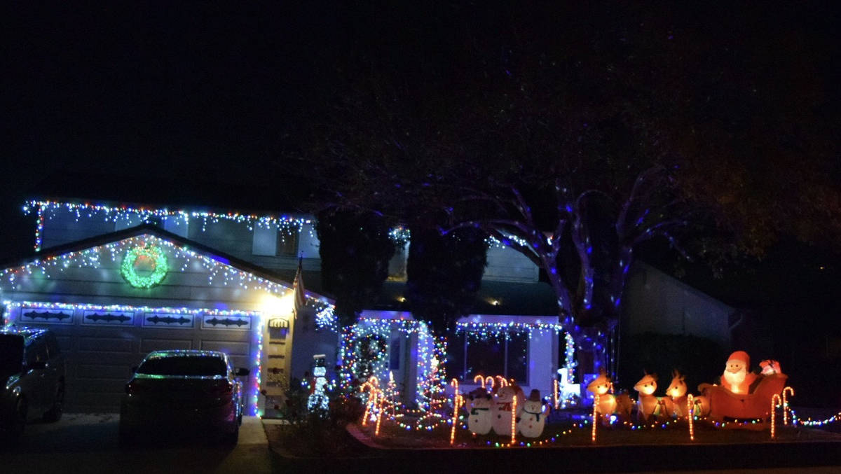 Dennis Chatwin The home at 1405 Bronco Road is lit up every night from 5:30-9 p.m.